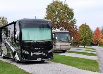 Rates Two RVs parked next to each other